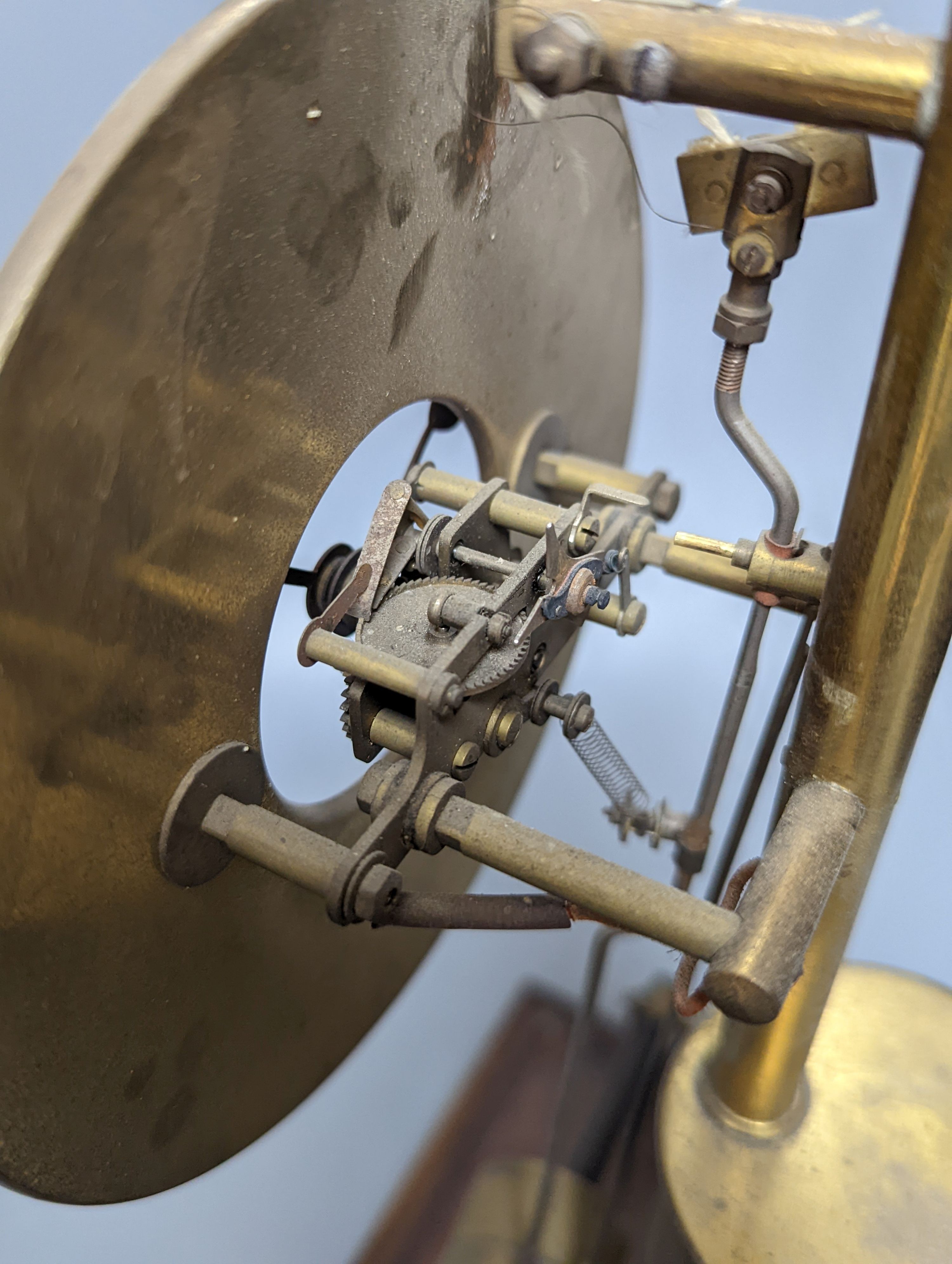 A Maurice Favre - Boulle electric pendulum clock, in a brass and mahogany four glass case, back-glass lacking, H.37.5cm